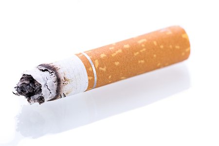 simsearch:695-05770887,k - stop smoking cigarettes ashtrey nicotine closeup isolated object Photographie de stock - Aubaine LD & Abonnement, Code: 400-07323927