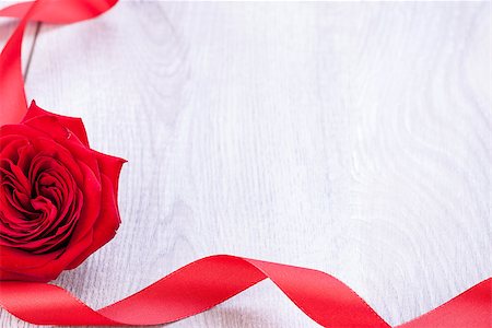 simsearch:689-03124881,k - Bouquet of beautiful fresh red roses with a coiled ribbon border isolated on white with plenty of copyspace for your loving anniversary or Valentines message Stock Photo - Budget Royalty-Free & Subscription, Code: 400-07323980