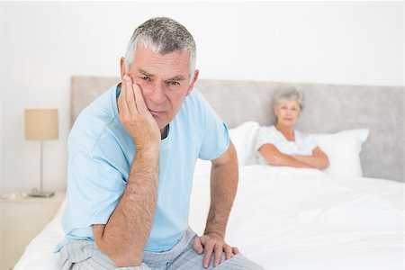 simsearch:400-07334704,k - Portrait of sad senior man with woman in bed at home Stock Photo - Budget Royalty-Free & Subscription, Code: 400-07334704