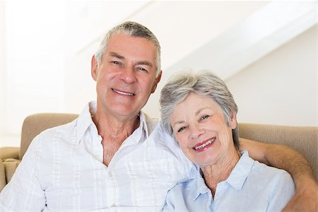 simsearch:400-07334704,k - Portrait of senior couple sitting on sofa at home Stock Photo - Budget Royalty-Free & Subscription, Code: 400-07334721