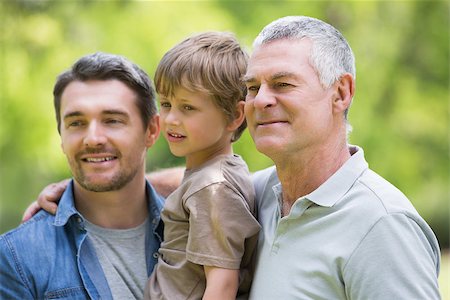 Grandfather father and son smiling against blurred background at the park Stock Photo - Budget Royalty-Free & Subscription, Code: 400-07336984