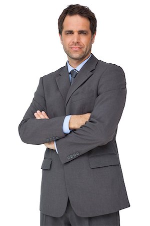 simsearch:400-07274414,k - Handsome businessman looking at camera with arms crossed on white background Photographie de stock - Aubaine LD & Abonnement, Code: 400-07337465