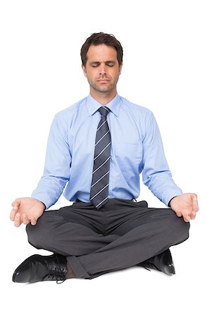 Zen businessman meditating in yoga pose on white background Stock Photo - Budget Royalty-Free & Subscription, Code: 400-07337489