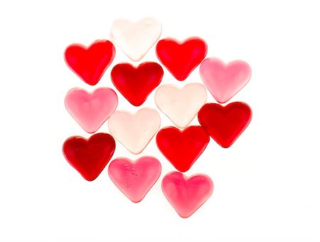 simsearch:859-03038099,k - Brightly coloured red gummy hearts as valentine present isolated on white background Stockbilder - Microstock & Abonnement, Bildnummer: 400-07337595