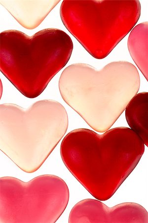 simsearch:859-03038099,k - Brightly coloured red gummy hearts as valentine present isolated on white background Stockbilder - Microstock & Abonnement, Bildnummer: 400-07337596