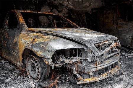 simsearch:693-03317587,k - Close up photo of a burned out cars in garage after fire for grunge use Stock Photo - Budget Royalty-Free & Subscription, Code: 400-07337592