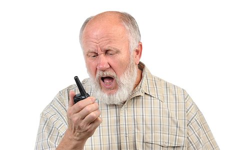 simsearch:400-04485729,k - senior bald man talking using walkie-talkie, with mouth open Stock Photo - Budget Royalty-Free & Subscription, Code: 400-07337649