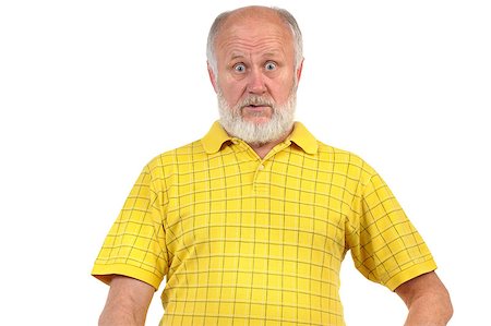 surprised old man with a beard - amazed and astonished senior bald man in yellow shirt Stock Photo - Budget Royalty-Free & Subscription, Code: 400-07337654