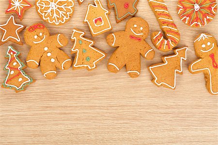 simsearch:400-07175496,k - Homemade various christmas gingerbread cookies on wooden background with copy space Fotografie stock - Microstock e Abbonamento, Codice: 400-07337767