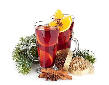 Christmas mulled wine with spices and snowy fir tree. Isolated on white background Stock Photo - Budget Royalty-Free & Subscription, Code: 400-07337800