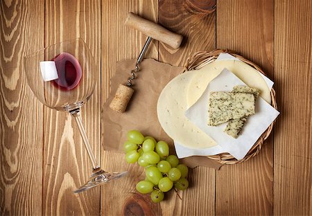 stopper - Red wine, cheese and grape on wooden table background Stock Photo - Budget Royalty-Free & Subscription, Code: 400-07337843