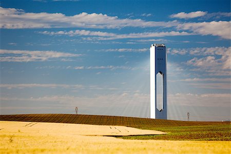 Solar Tower with rays  - thermo-solar power - blue sky and yellow field - horizontal Stock Photo - Budget Royalty-Free & Subscription, Code: 400-07338597