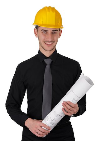 simsearch:400-06098950,k - Young man wearing a hard hat and holding a roll of blueprints Photographie de stock - Aubaine LD & Abonnement, Code: 400-07338674