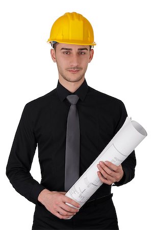 simsearch:400-06098950,k - Young man wearing a hard hat and holding a roll of blueprints Photographie de stock - Aubaine LD & Abonnement, Code: 400-07338675