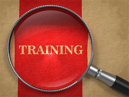 simsearch:400-08618963,k - Training concept. Magnifying Glass on Old Paper with Red Vertical Line Background. Stock Photo - Budget Royalty-Free & Subscription, Code: 400-07338826