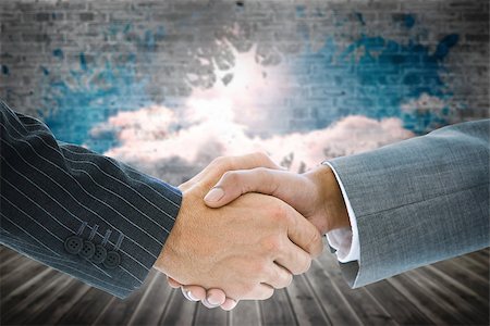 simsearch:400-07339626,k - Composite image of business handshake against clouds on brick wall Stock Photo - Budget Royalty-Free & Subscription, Code: 400-07339578