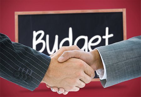 simsearch:400-07339626,k - Composite image of business handshake against budget written on a blackboard Stock Photo - Budget Royalty-Free & Subscription, Code: 400-07339587