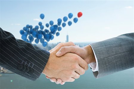 simsearch:400-07339684,k - Composite image of business handshake against balloons above coastline Stock Photo - Budget Royalty-Free & Subscription, Code: 400-07339626
