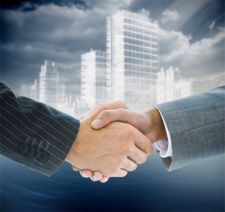 simsearch:400-07339684,k - Composite image of business handshake against digital cityscape Stock Photo - Budget Royalty-Free & Subscription, Code: 400-07339628