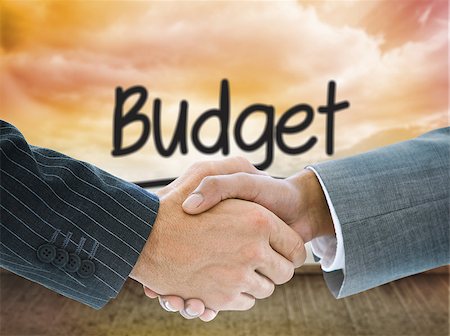 simsearch:400-07339684,k - Composite image of business handshake against budget written on wall with sky Stock Photo - Budget Royalty-Free & Subscription, Code: 400-07339683