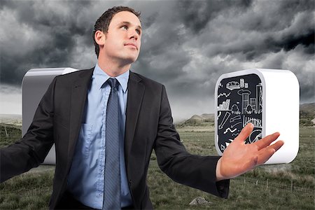 simsearch:400-07344883,k - Businessman posing with arms out against stormy countryside background Stock Photo - Budget Royalty-Free & Subscription, Code: 400-07339780