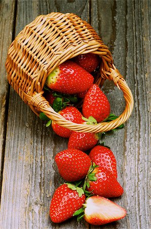 simsearch:400-08020671,k - Fresh Ripe Strawberries Skattered from Wicker Basket isolated on white background Stock Photo - Budget Royalty-Free & Subscription, Code: 400-07330326