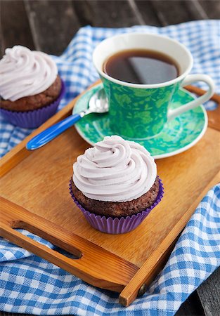 simsearch:400-07917638,k - Cupcake and cup of coffee on the tray Stock Photo - Budget Royalty-Free & Subscription, Code: 400-07330362