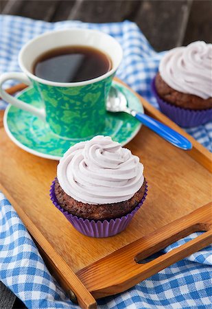 simsearch:400-07917638,k - Cupcake and cup of coffee on the tray Stock Photo - Budget Royalty-Free & Subscription, Code: 400-07330849