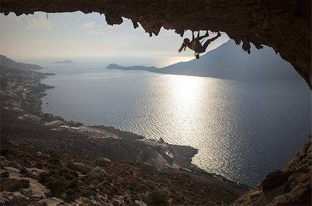 simsearch:400-07292725,k - Family rock climber against picturesque view of Telendos Island at sunset. Kalymnos Island, Greece. Photographie de stock - Aubaine LD & Abonnement, Code: 400-07330963