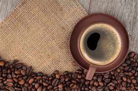 simsearch:400-07299272,k - Coffee cup and beans on wooden table background with copy space Foto de stock - Super Valor sin royalties y Suscripción, Código: 400-07331478