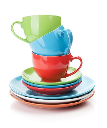 simsearch:400-07331603,k - Colorful cups and saucers. Isolated on white background Foto de stock - Super Valor sin royalties y Suscripción, Código: 400-07331604