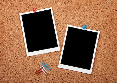 family abstract - Blank instant photo frames on cork wooden background Stock Photo - Budget Royalty-Free & Subscription, Code: 400-07331625