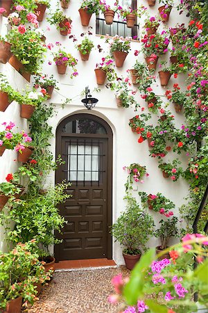 Spring and Easter Flowers Decoration of Old House, Spain, Cordoba, European town Stock Photo - Budget Royalty-Free & Subscription, Code: 400-07331849