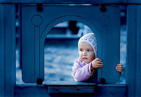 Young girl on the playground. Stockbilder - Microstock & Abonnement, Bildnummer: 400-07331953