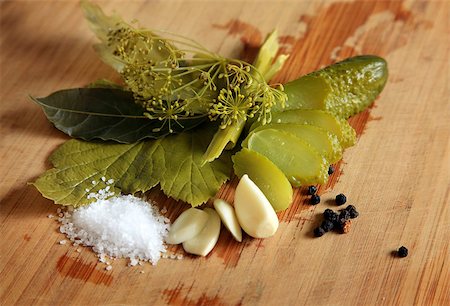 pickling gherkin - Pickled cucumber still life on old plank Stock Photo - Budget Royalty-Free & Subscription, Code: 400-07332168