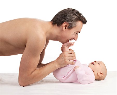 father and child cry - Young Caucasian father leaning over newborn son Stock Photo - Budget Royalty-Free & Subscription, Code: 400-07332472