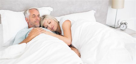 romantic couple sleeping together - Loving mature man and woman lying in bed at the home Stock Photo - Budget Royalty-Free & Subscription, Code: 400-07333760