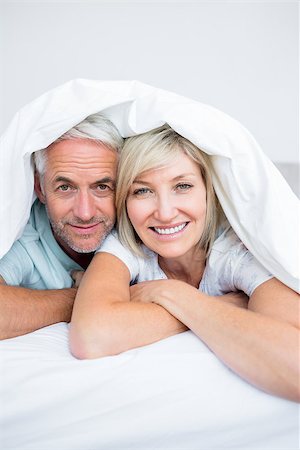 romantic pictures of lovers sleeping - Closeup portrait of a mature couple lying in bed at home Stock Photo - Budget Royalty-Free & Subscription, Code: 400-07333824