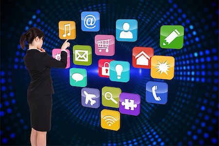 simsearch:400-07345820,k - Thoughtful businesswoman pointing against futuristic dotted blue and black background Stock Photo - Budget Royalty-Free & Subscription, Code: 400-07344274