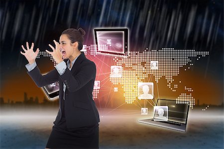 Angry businesswoman gesturing against cityscape on the horizon Stock Photo - Budget Royalty-Free & Subscription, Code: 400-07345738