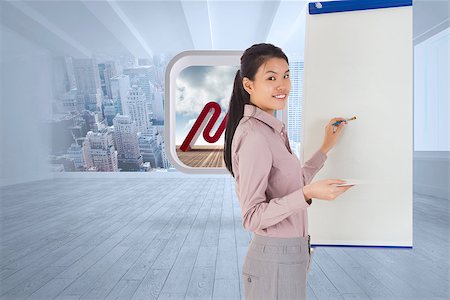 simsearch:400-07277816,k - Businesswoman painting on an easel against city scene in a room Fotografie stock - Microstock e Abbonamento, Codice: 400-07340203