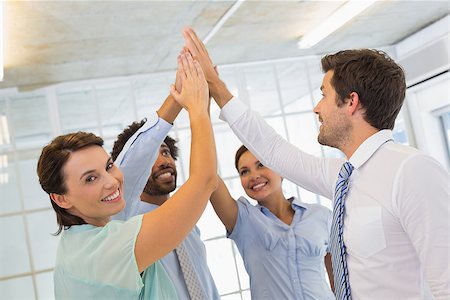 four hand joined - Portrait of business team joining hands together in the office Stock Photo - Budget Royalty-Free & Subscription, Code: 400-07340902