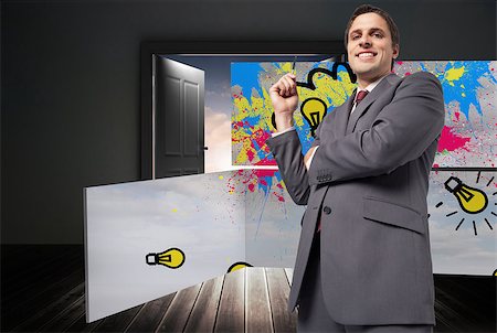 simsearch:400-06882578,k - Thoughtful businessman holding pen against doors opening to reveal beautiful sky Stock Photo - Budget Royalty-Free & Subscription, Code: 400-07340949