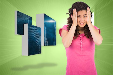 Cute brunette having headache against bright green room with windows Stock Photo - Budget Royalty-Free & Subscription, Code: 400-07341103