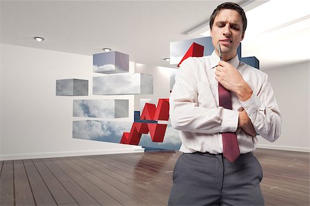 Thoughtful businessman holding pen to chin against digitally generated room with stairs Stock Photo - Budget Royalty-Free & Subscription, Code: 400-07341546