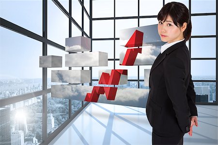 simsearch:400-07447273,k - Serious businesswoman against room with large windows showing city Stock Photo - Budget Royalty-Free & Subscription, Code: 400-07341553