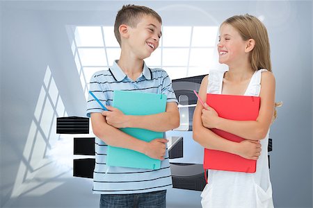 futuristic clock - Smiling brother and sister holding their exercise books against room with holographic cloud Stock Photo - Budget Royalty-Free & Subscription, Code: 400-07341596