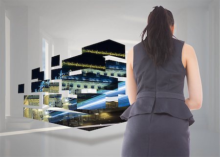 simsearch:400-07277781,k - Thinking asian businesswoman against bright white hall with columns Stock Photo - Budget Royalty-Free & Subscription, Code: 400-07341603