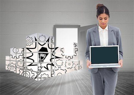 simsearch:400-06882578,k - Businesswoman looking at laptop in her hands against open door on white wall Stock Photo - Budget Royalty-Free & Subscription, Code: 400-07342046