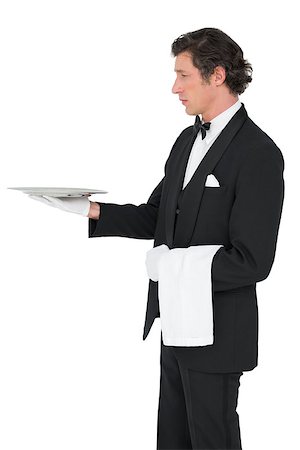 person and cut out and waiter - Server in suit holding tray isolated over white background Stock Photo - Budget Royalty-Free & Subscription, Code: 400-07342518